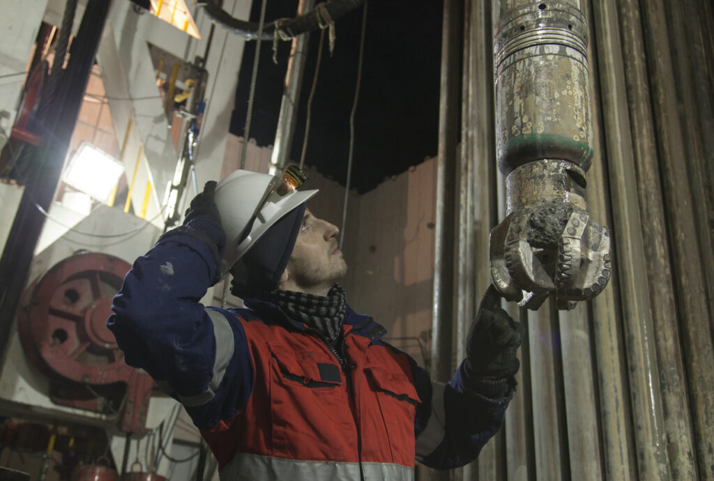 Oil worker in a drilling rig
